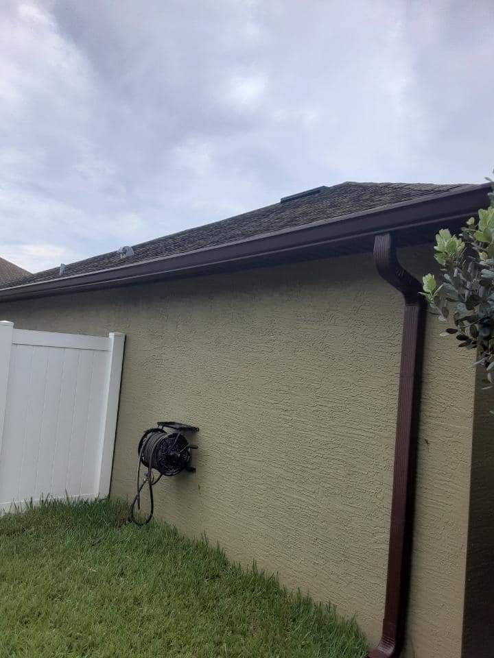 House with nice brown gutter — St. Cloud, FL — MJ’s Home Solutions LLC
