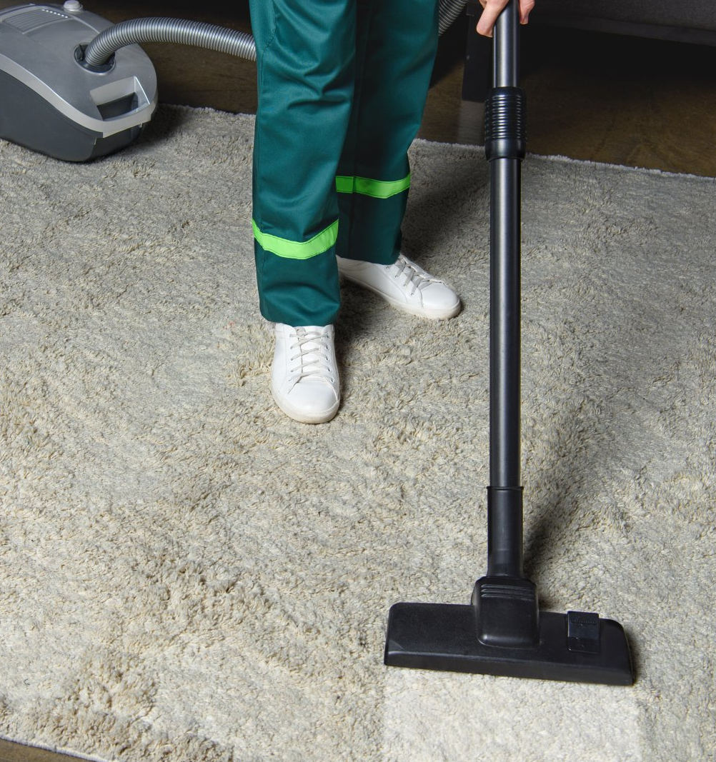 a man cleaning carpets