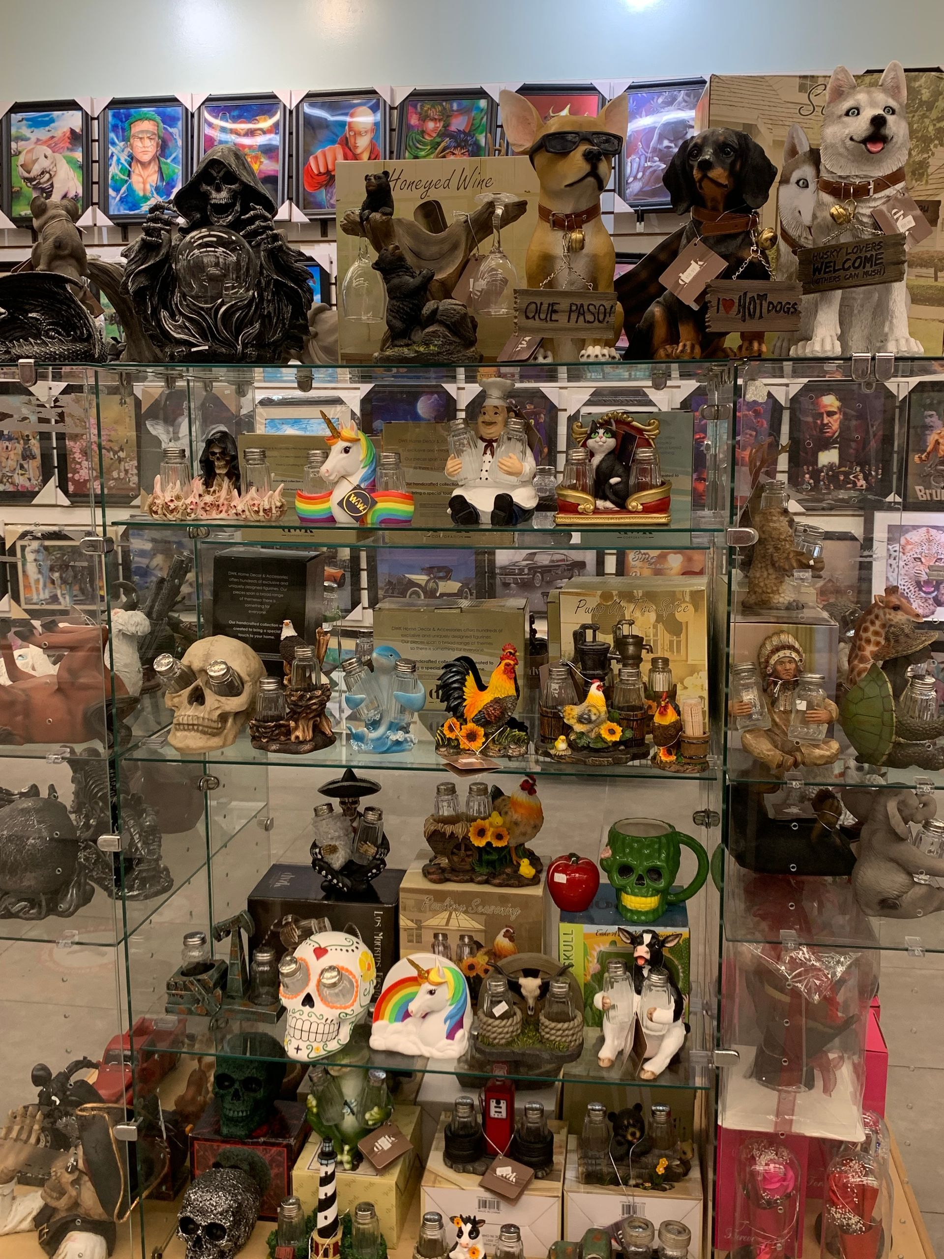 A display case filled with lots of toys and figurines in a store.