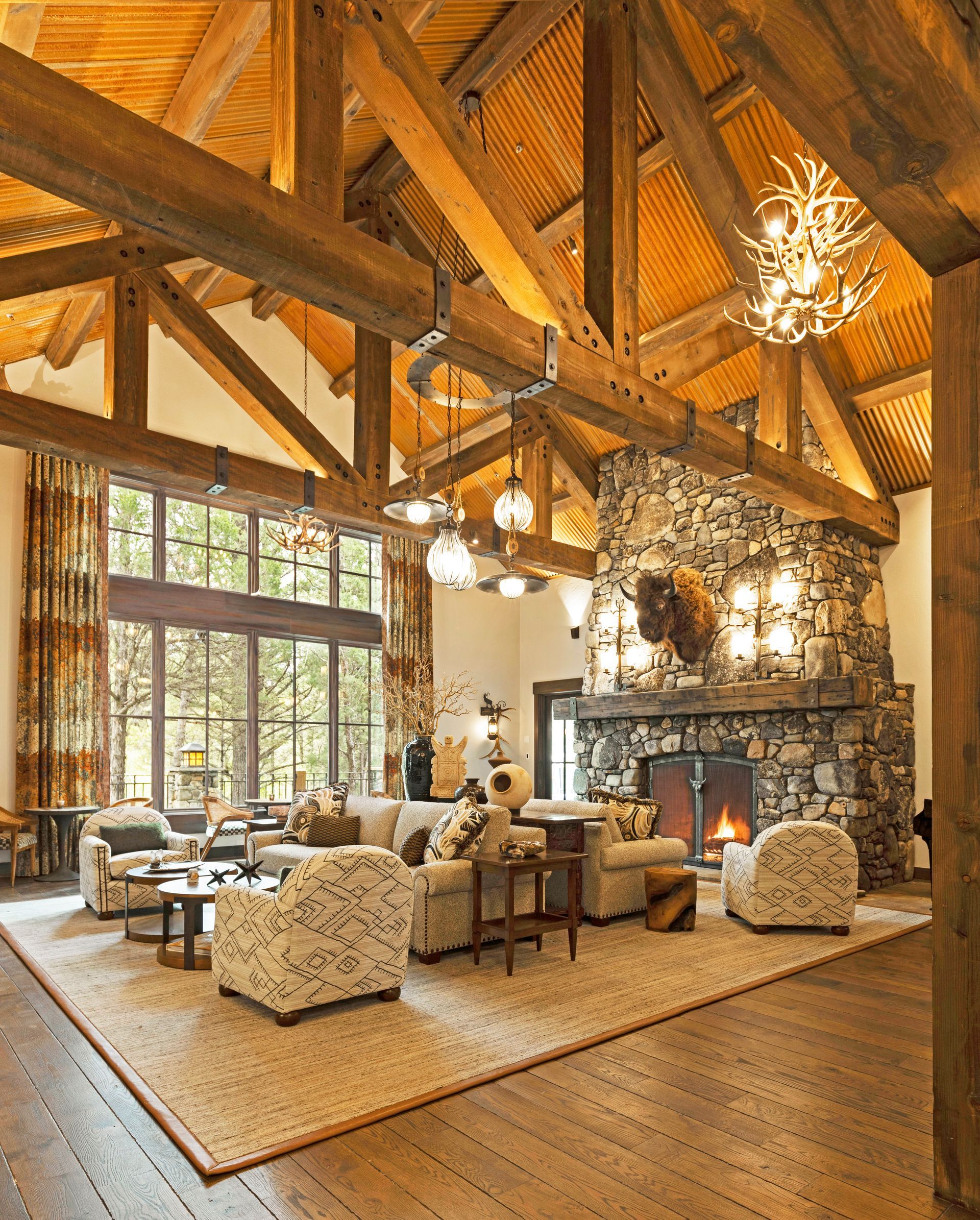 A living room with a fireplace and lots of furniture