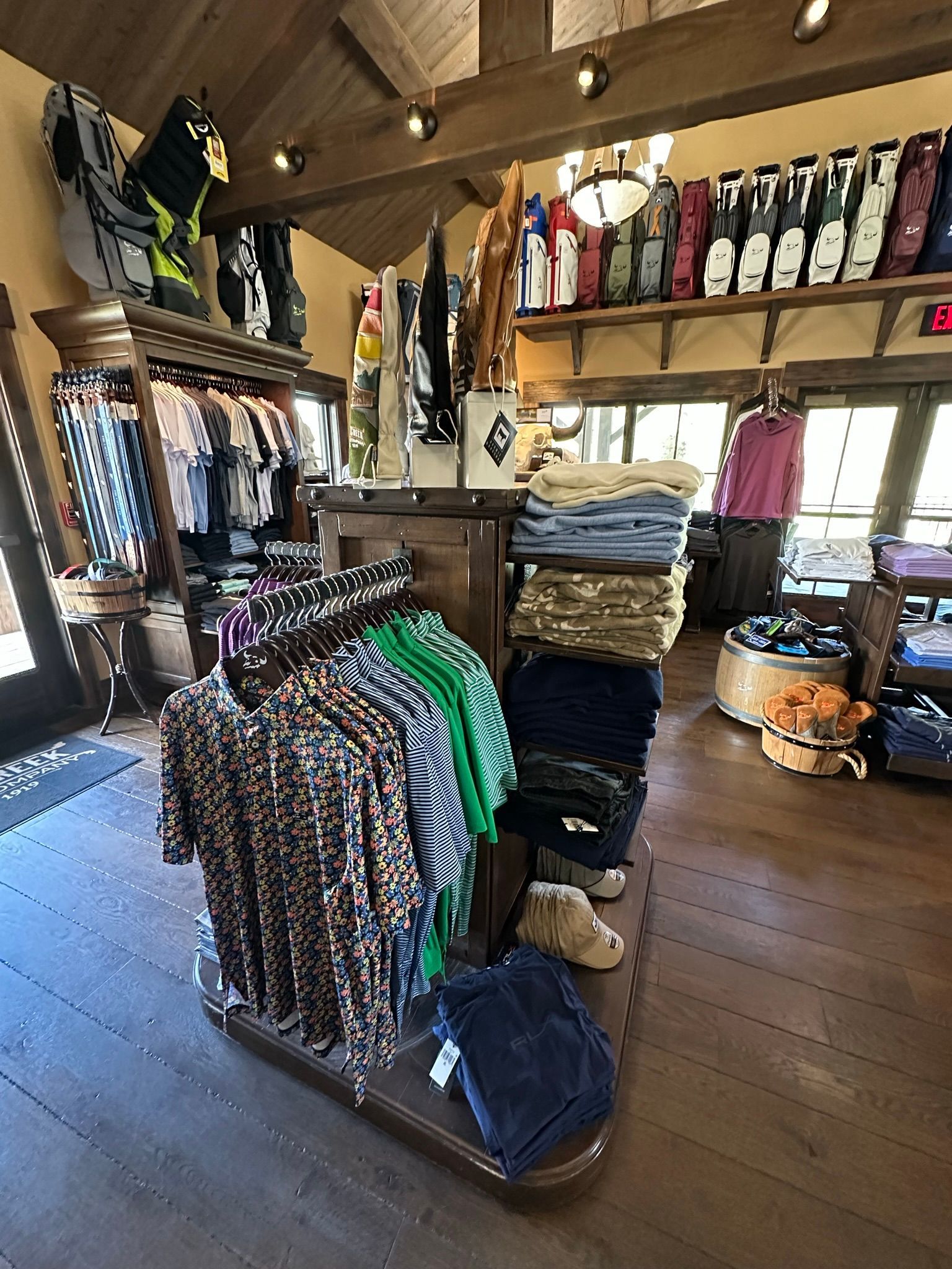 A store filled with lots of clothes and bags.