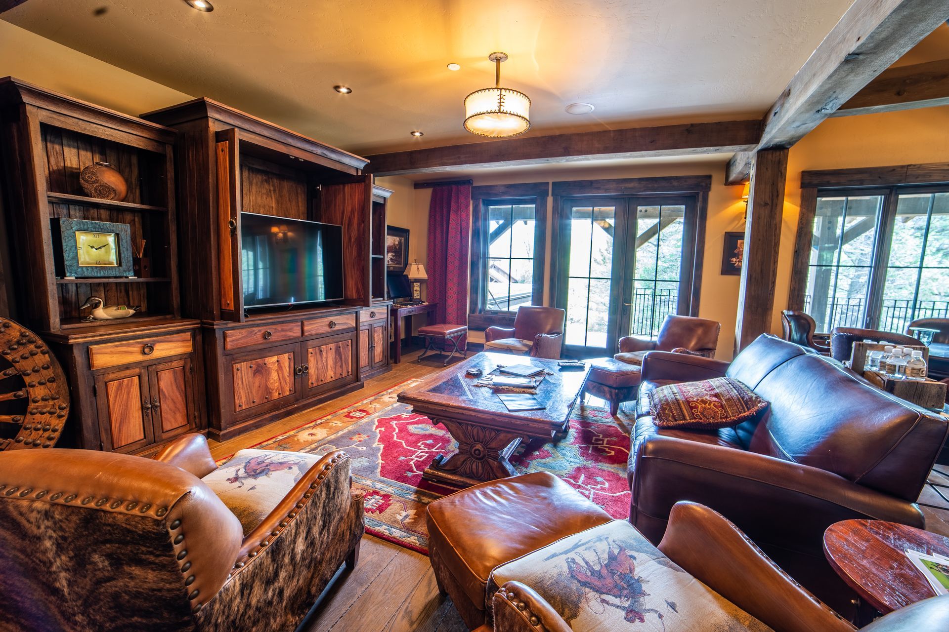 A living room filled with furniture and a flat screen tv.