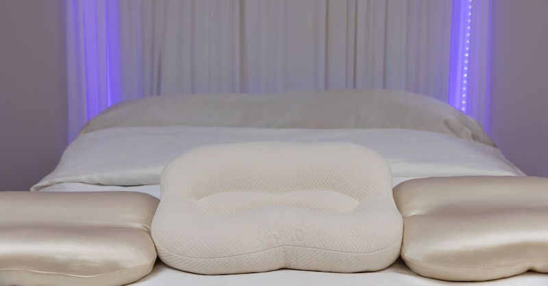 Sleep Goddess Pillows on a bed