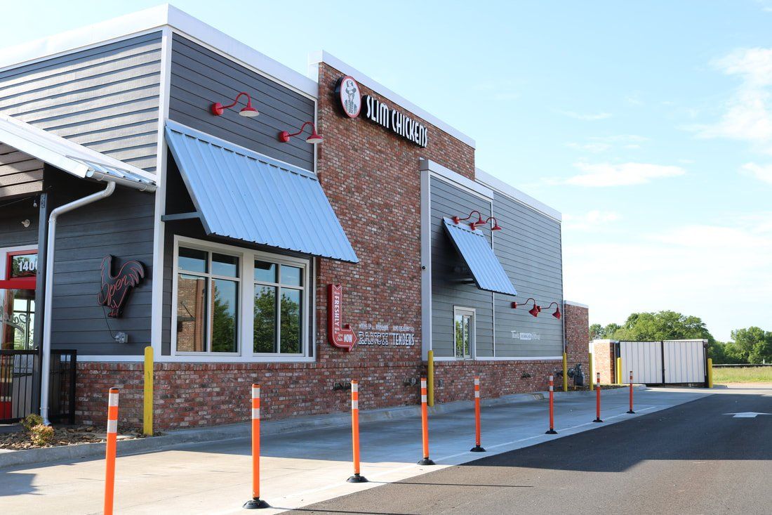 slim chickens building services in nwa