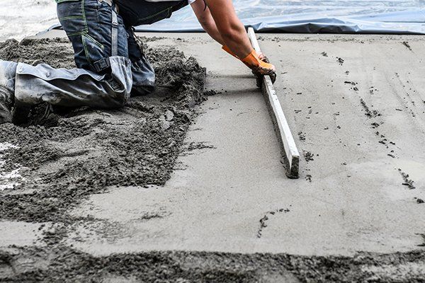 Worker Pave the Roadway — Thatcher, AZ — Woodside Construction, LLC