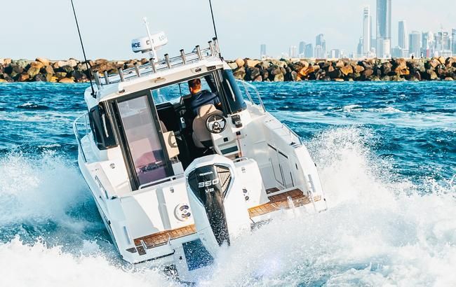 White Motorboat Navigating Choppy Blue Water — TJM Rockhampton in Rockhampton City, QLD