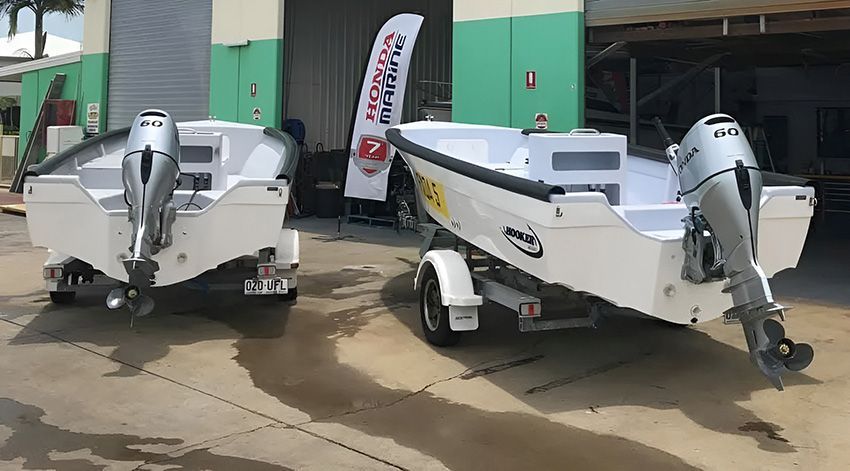 Two Boats Are Parked Next to Each Other — Mackay Marine Services in Mackay, QLD