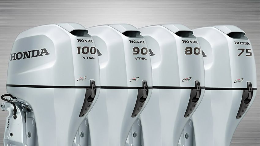 Four Honda Outboard Motors Are Lined Up in a Row — Mackay Marine Services in Mackay, QLD