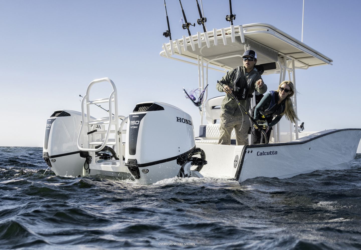 White Motorboat on Water With Two People, Person Standing — TJM Rockhampton in Rockhampton City, QLD