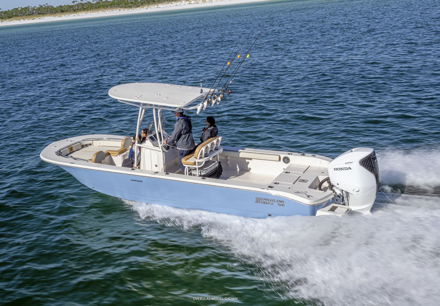 Blue and White Motorboat Cruising on Water With Two People Aboard — TJM Rockhampton in Rockhampton City, QLD