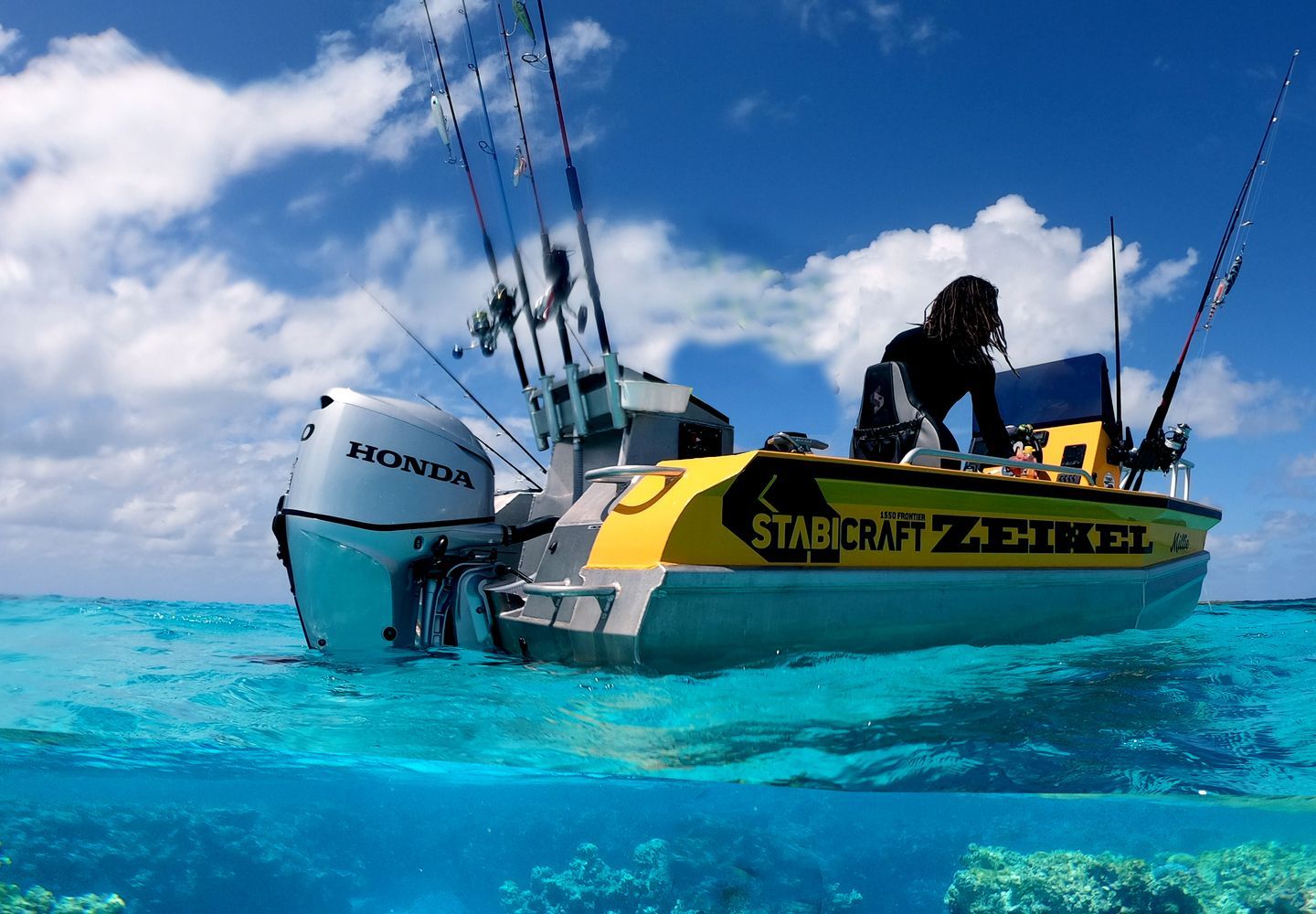 Yellow and Silver Fishing Boat in Clear Blue Water — TJM Rockhampton in Rockhampton City, QLD