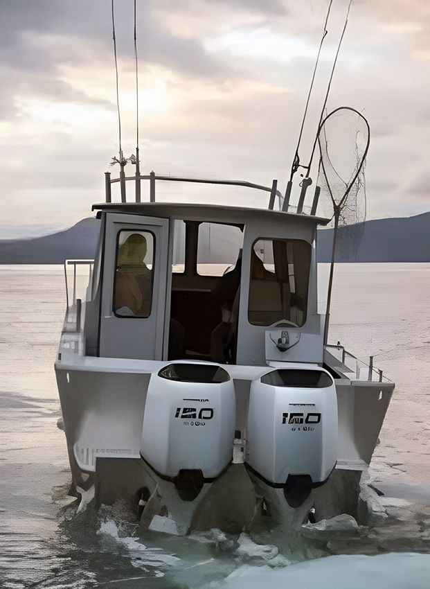 A Boat with Two Iso Engines on the Back of It — Mackay Marine Services in Mackay, QLD