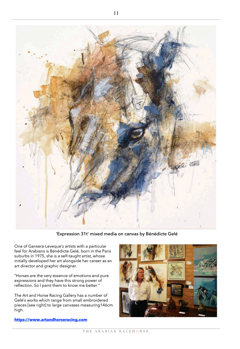 A woman is standing in front of a painting of a horse 's head.