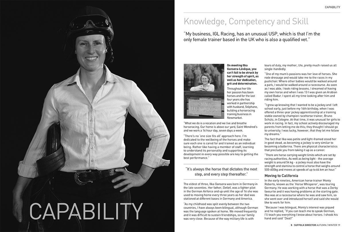 A woman wearing a helmet is standing next to a page that says capability