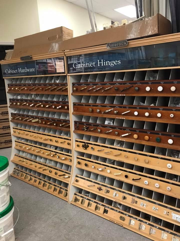 A display of cabinet hinges in a store.