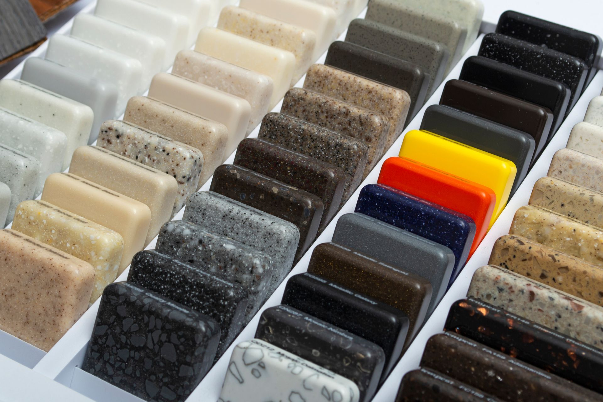 Samples of various countertop materials in different colors and patterns.