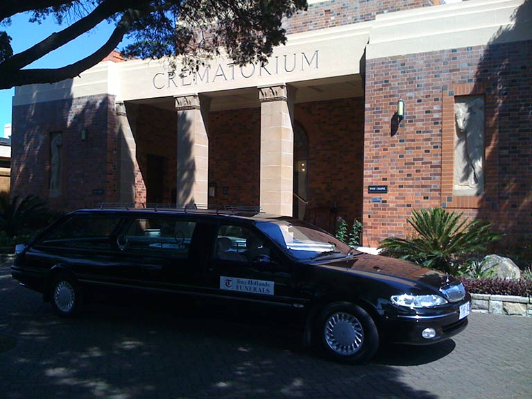 Image of a hearse parked outside the West Chapel Mt Thompson Memorial Gardens