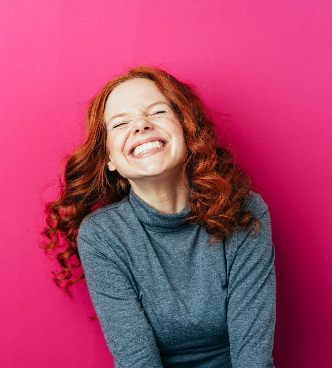 Red hair woman smiling