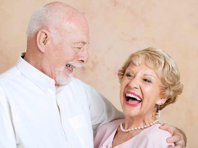 Elderly couple Embracing and smiling