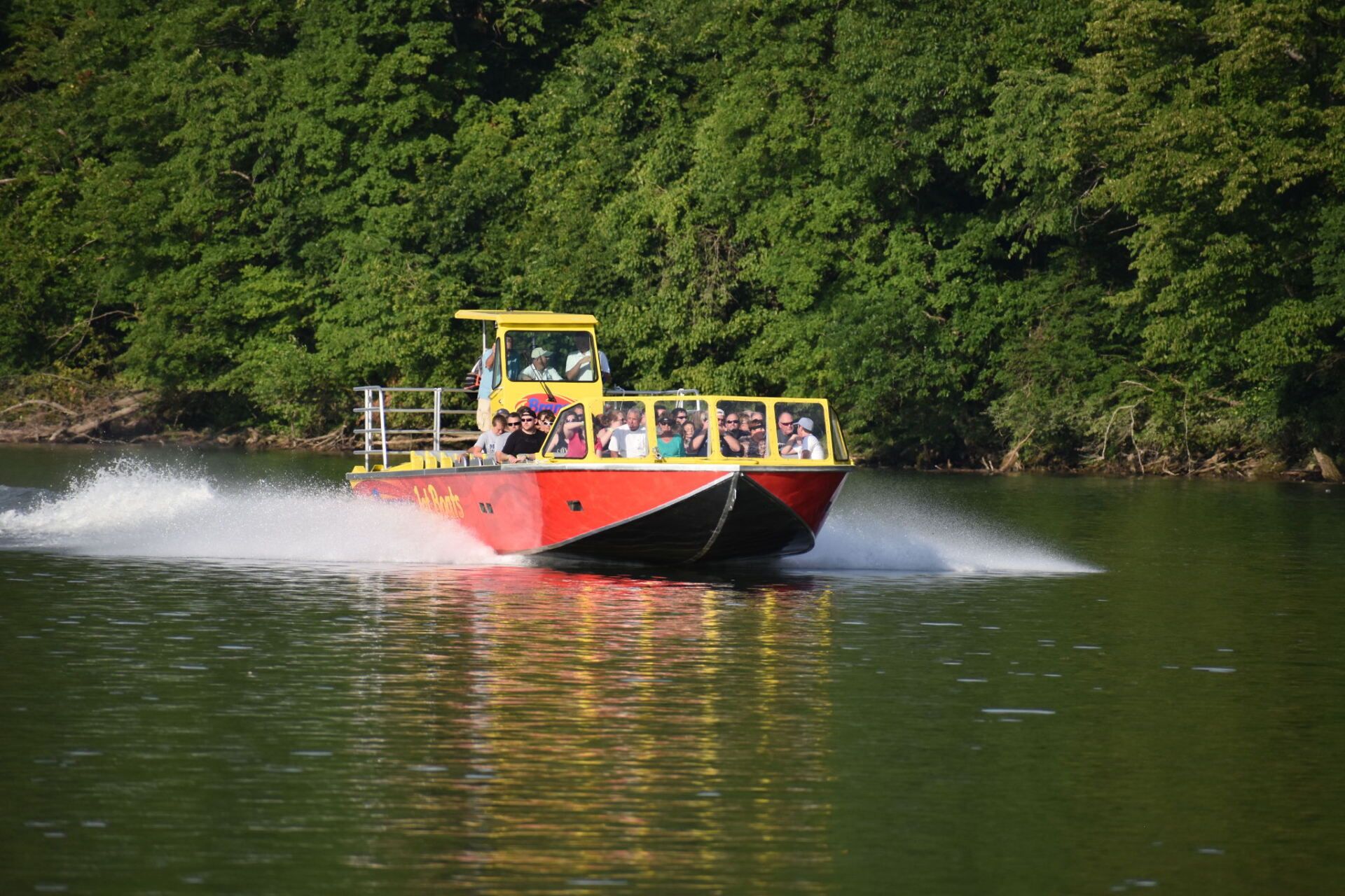 People riding a Branson Jet Boat