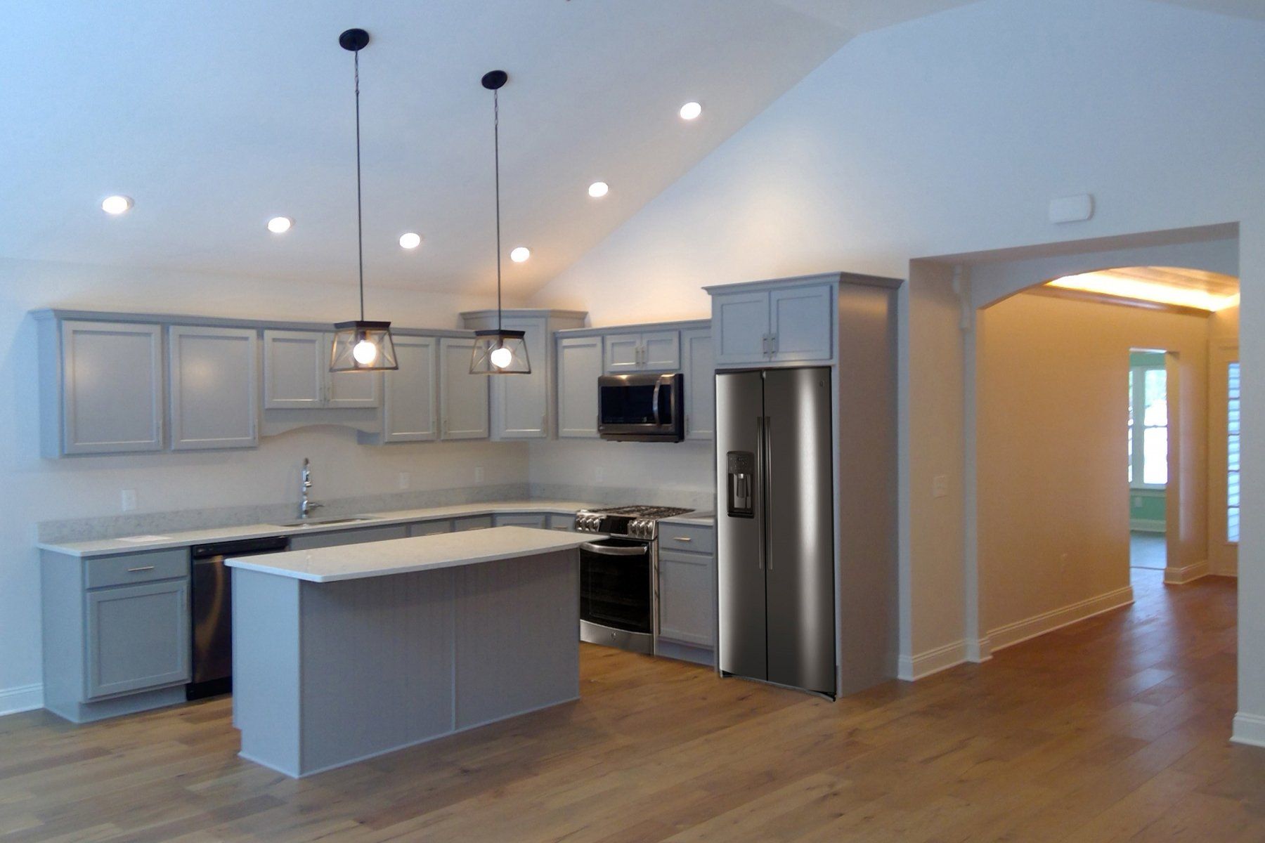 white kitchen with hardwood floor
