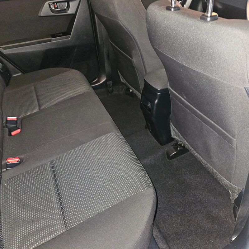 The Back Seat Of A Car With Seat Belts Detailing — On Point Detailing Wagga in East Wagga Wagga, NSW