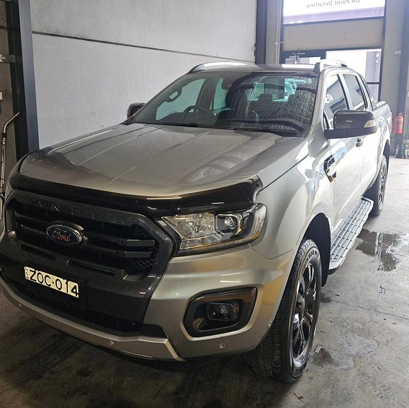 A Silver Ford Ranger Is Parked In A Garage — On Point Detailing Wagga in East Wagga Wagga, NSW