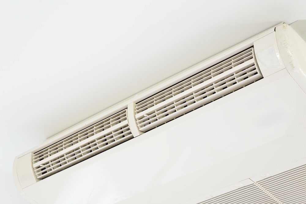 White Air Conditioner Mounted on a White Ceiling, Angled View — Hinterland Air Conditioning Sunshine Coast in Montville, QLD