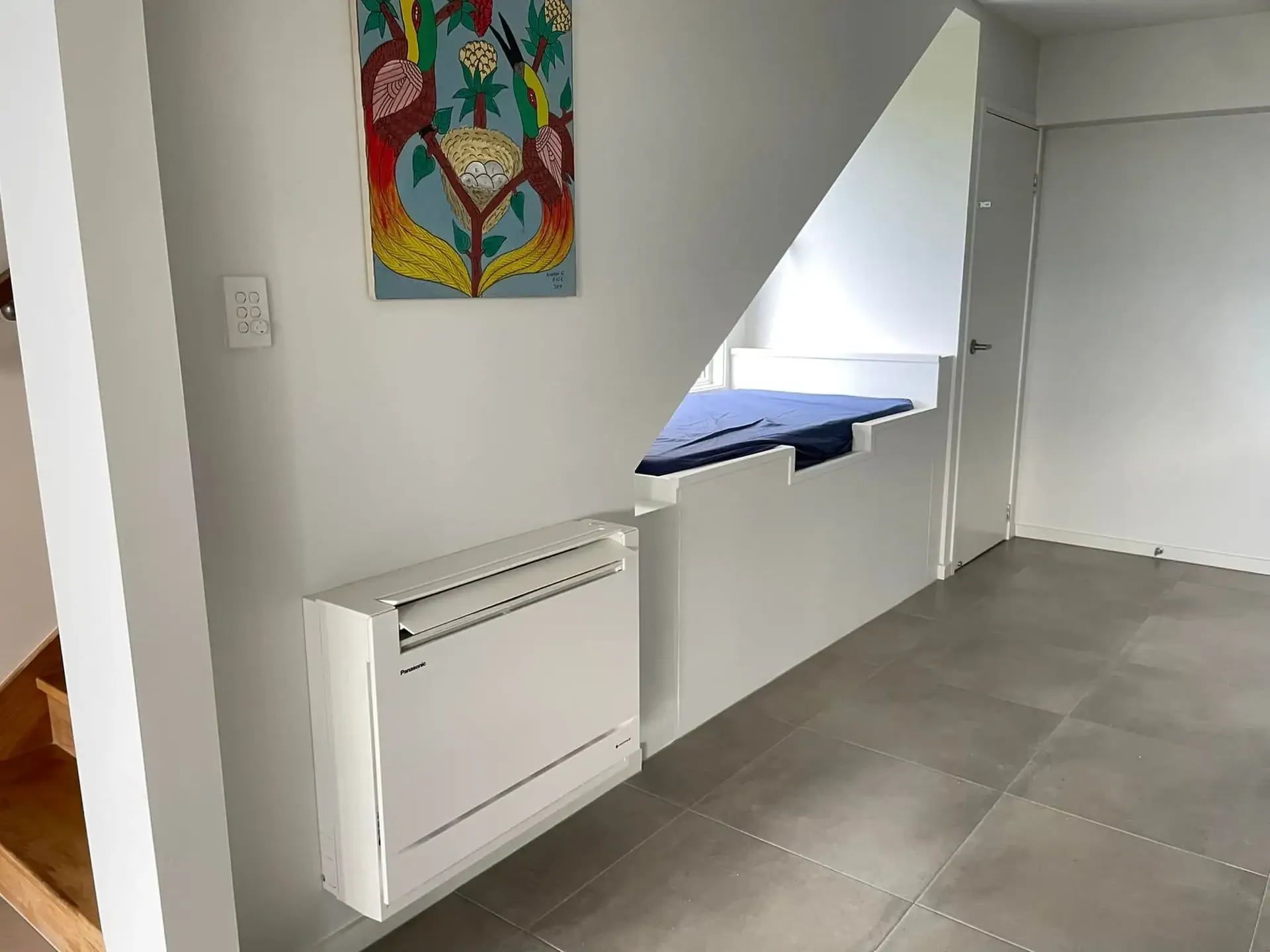 White Room With an Artwork and Air Conditioner — Hinterland Air Conditioning Sunshine Coast in Palmwoods, QLD