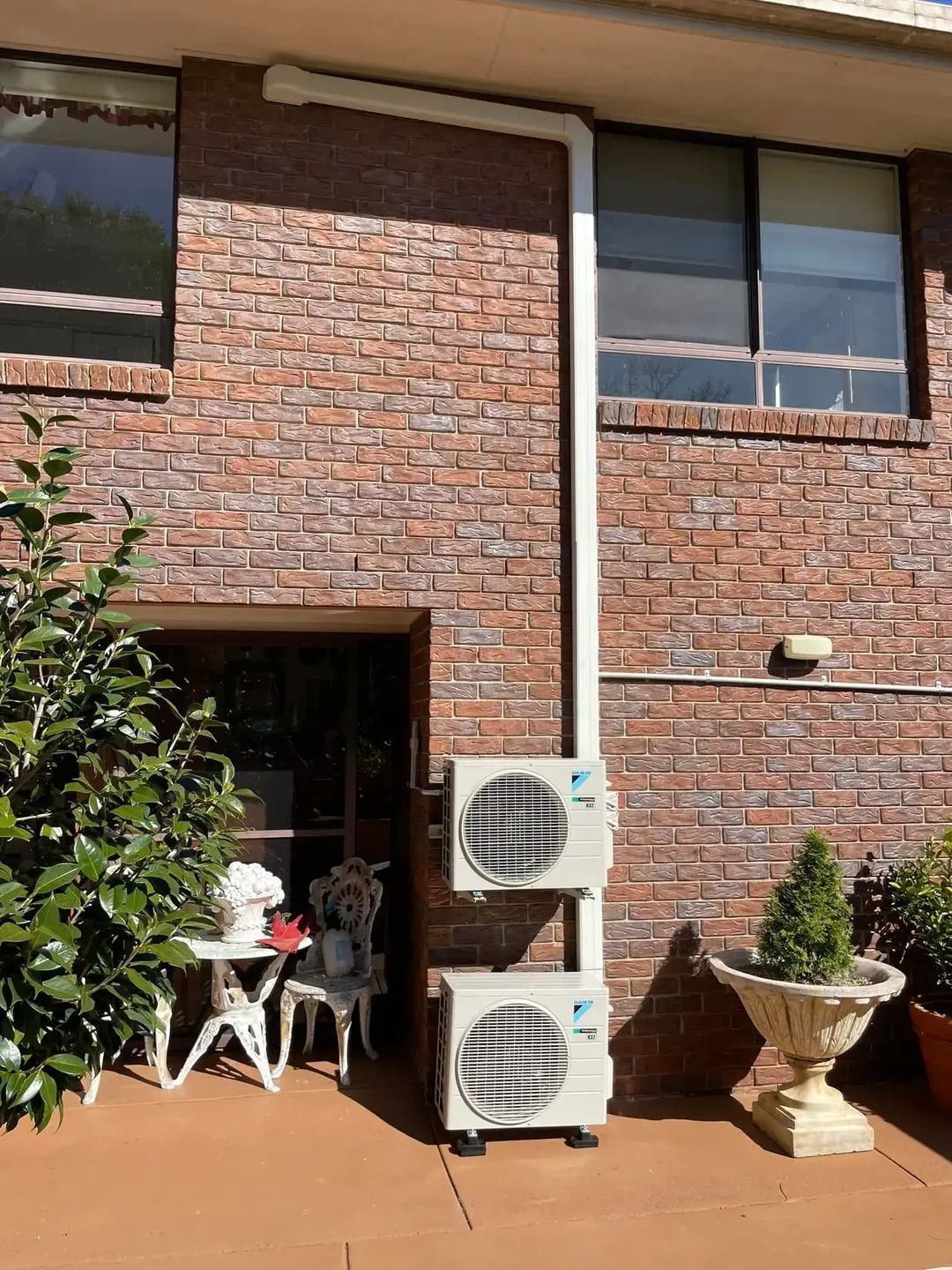 Air Conditioning Units on a Brick Wall — Hinterland Air Conditioning Sunshine Coast in Palmwoods, QLD