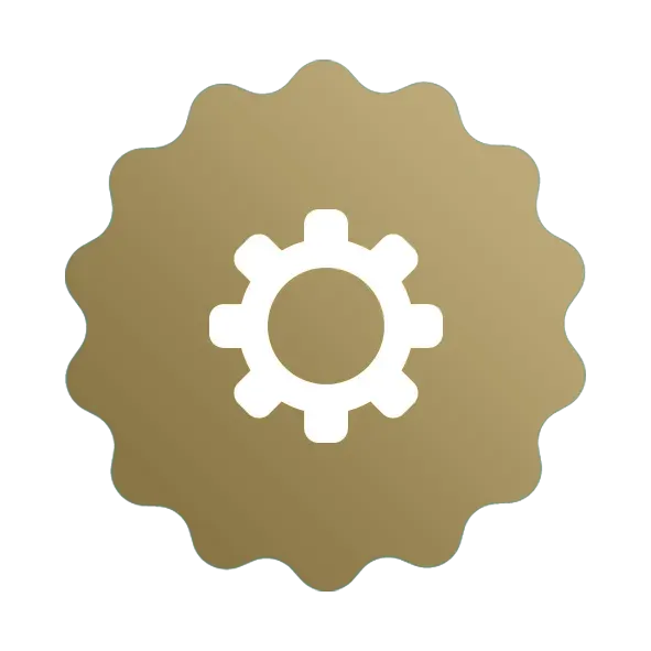 A gold circle with a white gear inside of it.