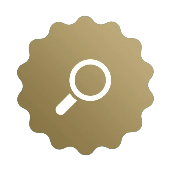 A magnifying glass icon in a gold circle on a white background.