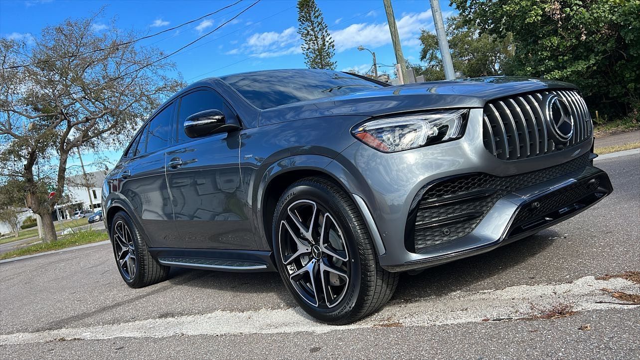 A mercedes benz gle 43 amg is parked on the side of the road.