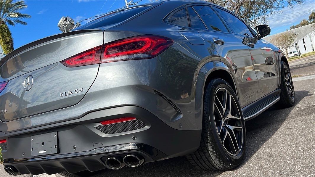 A mercedes benz gle 63 s is parked on the side of the road.