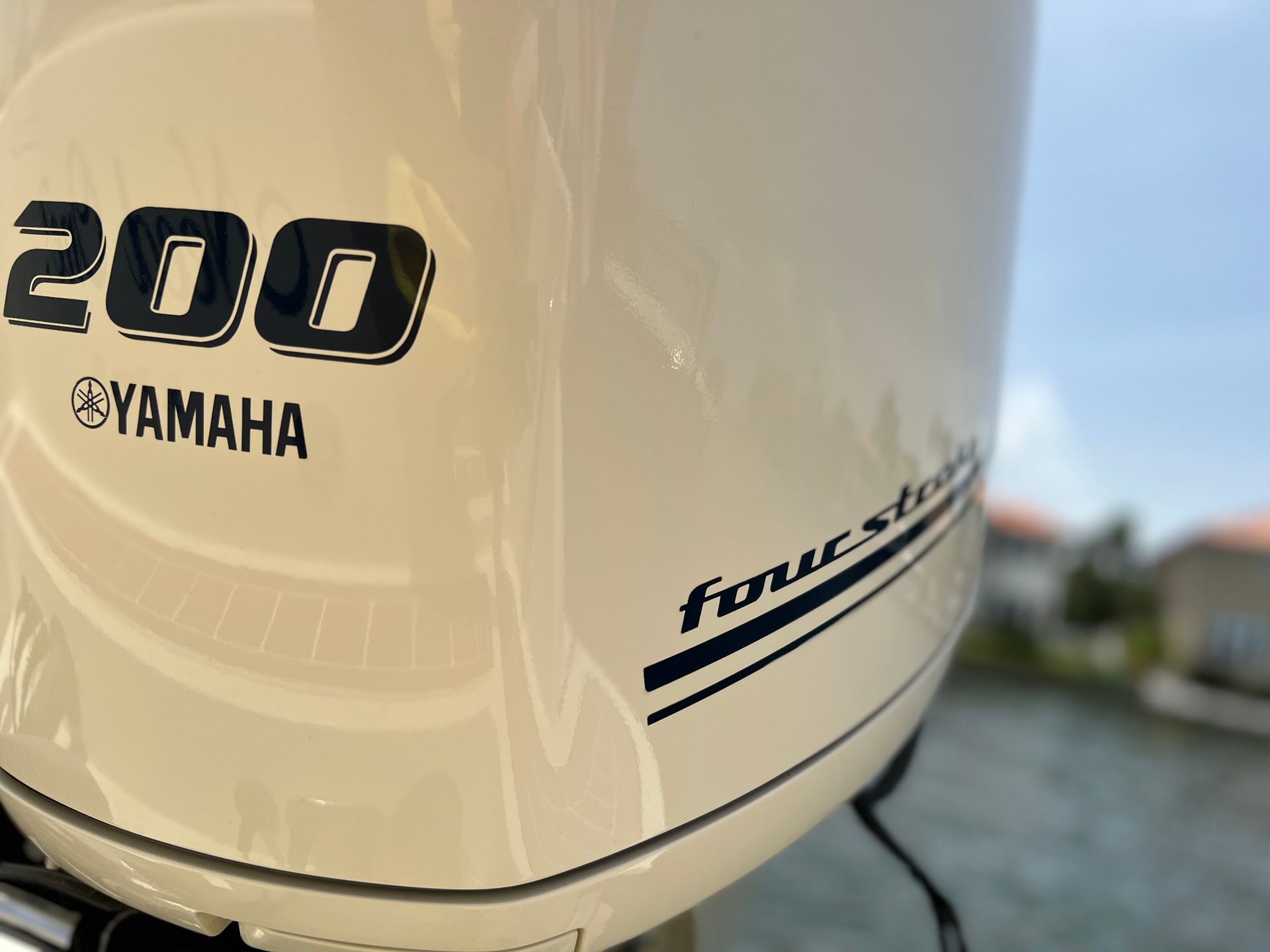 A close up of a yamaha 200 four stroke outboard motor