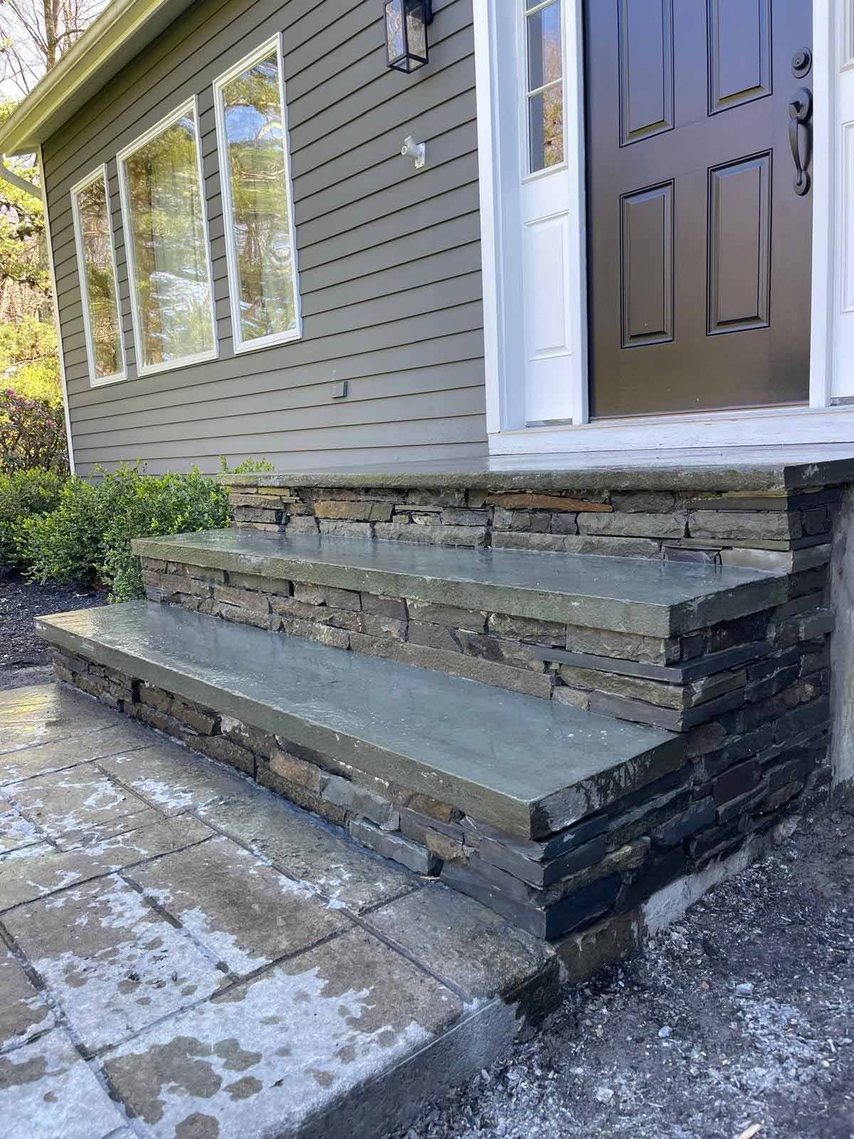A Stone Staircase Leading To The Front Door Of A House. — Kingston, NY — T.I. Contracting
