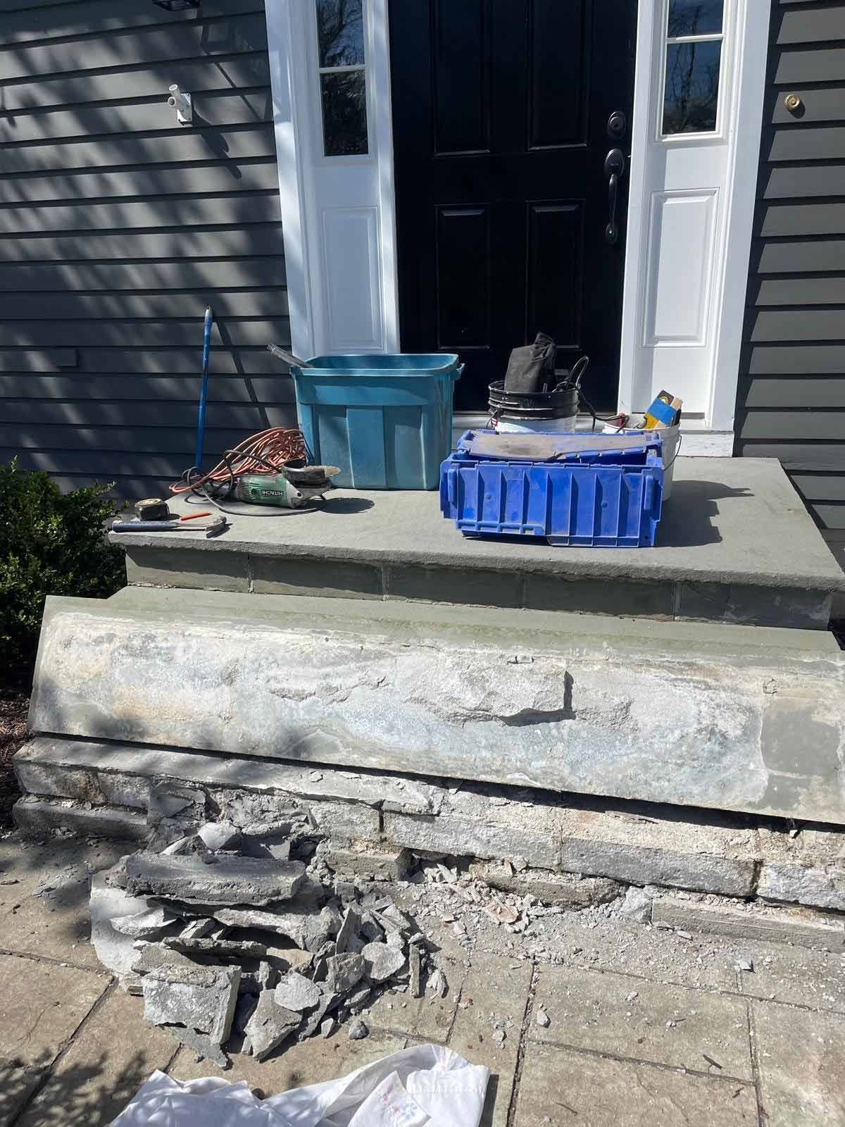 A Blue Box Is Sitting On A Porch Next To A House. — Kingston, NY — T.I. Contracting
