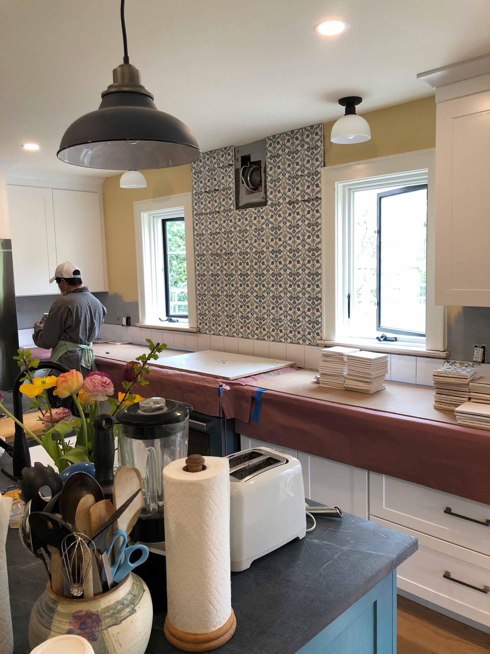 A Kitchen With A Toaster , Paper Towels , And A Blender On The Counter. — Kingston, NY — T.I. Contracting
