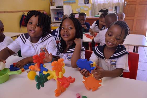 children of a young age in a classroom