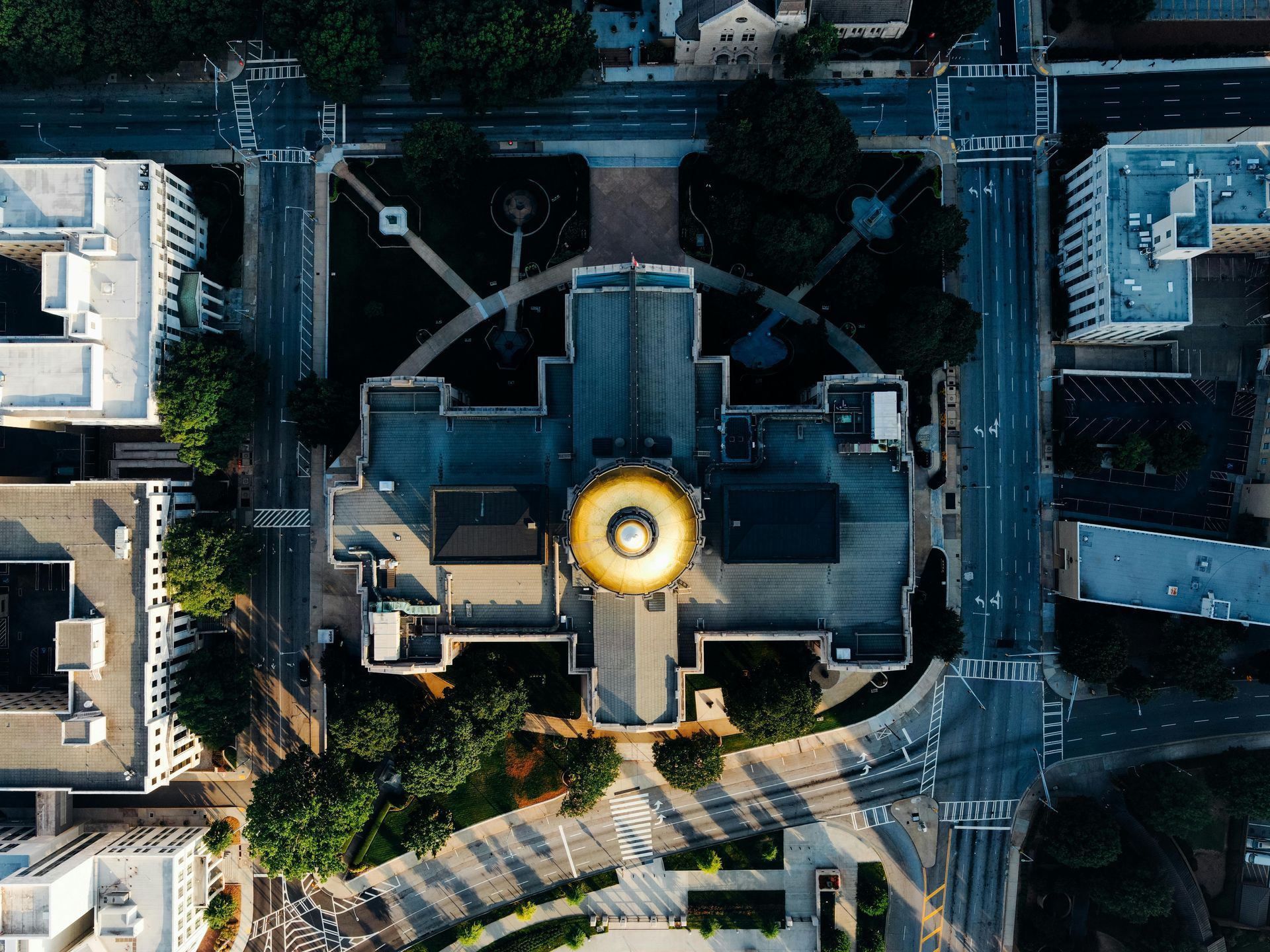 An aerial view of a large building in a city