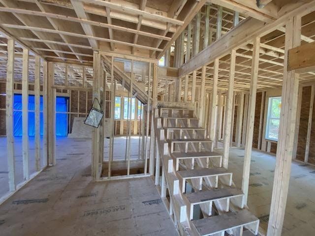 A staircase is being built in a house under construction