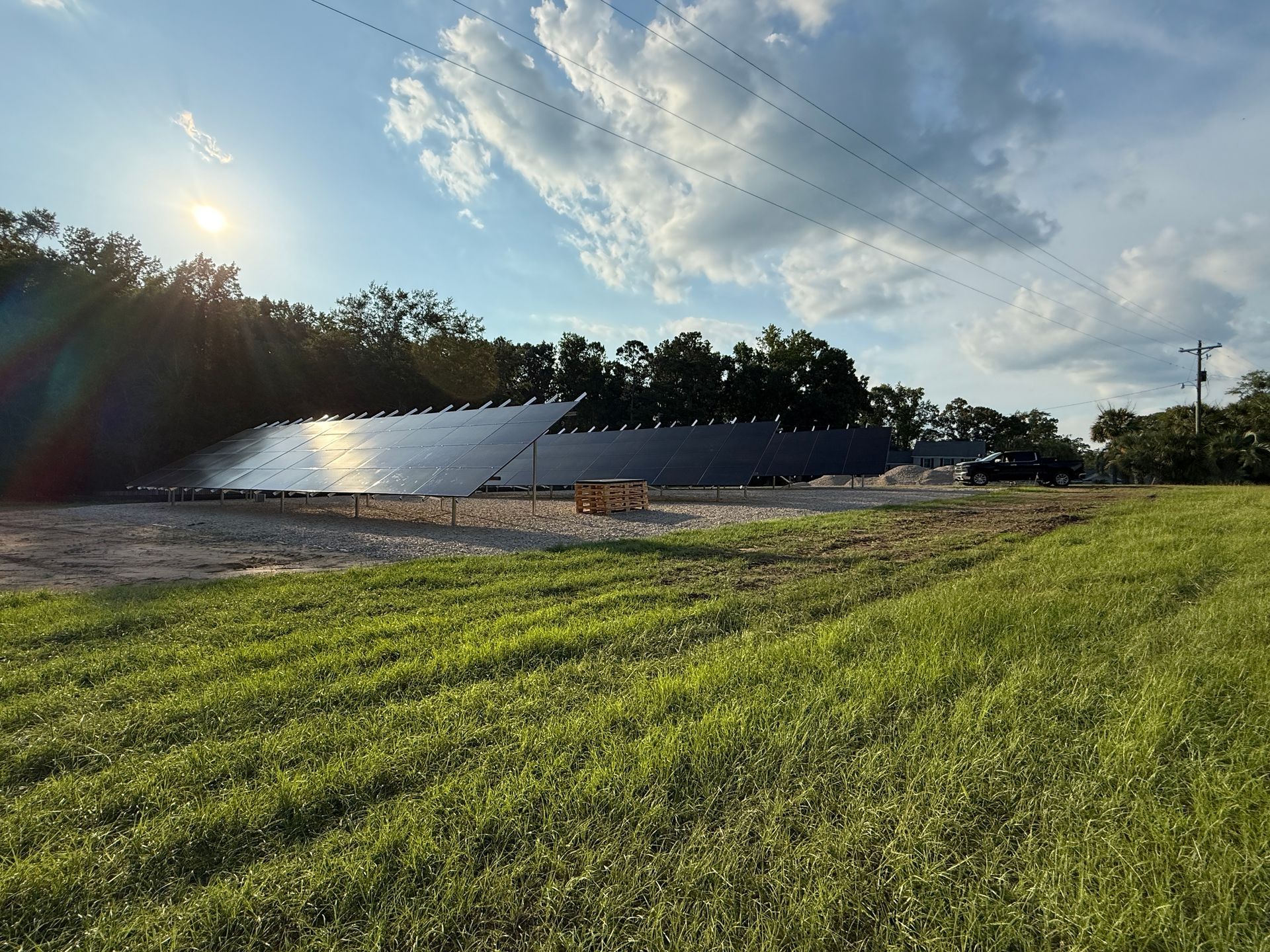 Solar panels installed on the rooftop of a charming brick house, harnessing renewable energy from the sun to power the home.