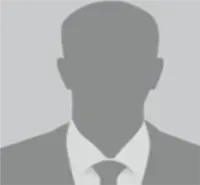 A silhouette of a man in a suit and tie without a face.