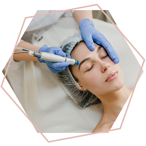 A woman is getting a facial treatment at a beauty salon.