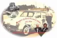 Vintage car with Bennett-Gilbert Funeral Home logo and photos of people.