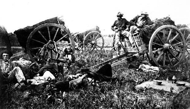 A Metis family camped with their Red River Carts in Pembina just south of the Canada/US border