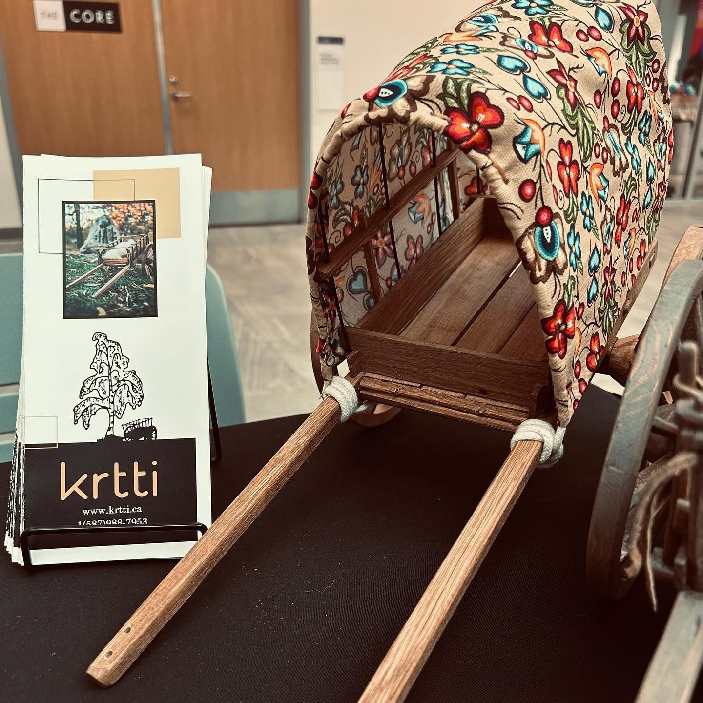 Krtti Contact flyer with a Special custom covered Red River Cart