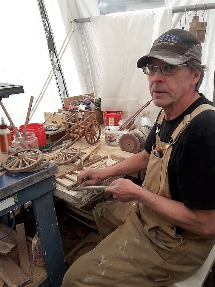 Garry Patterson in his workshop crafting Red River Cart replicas