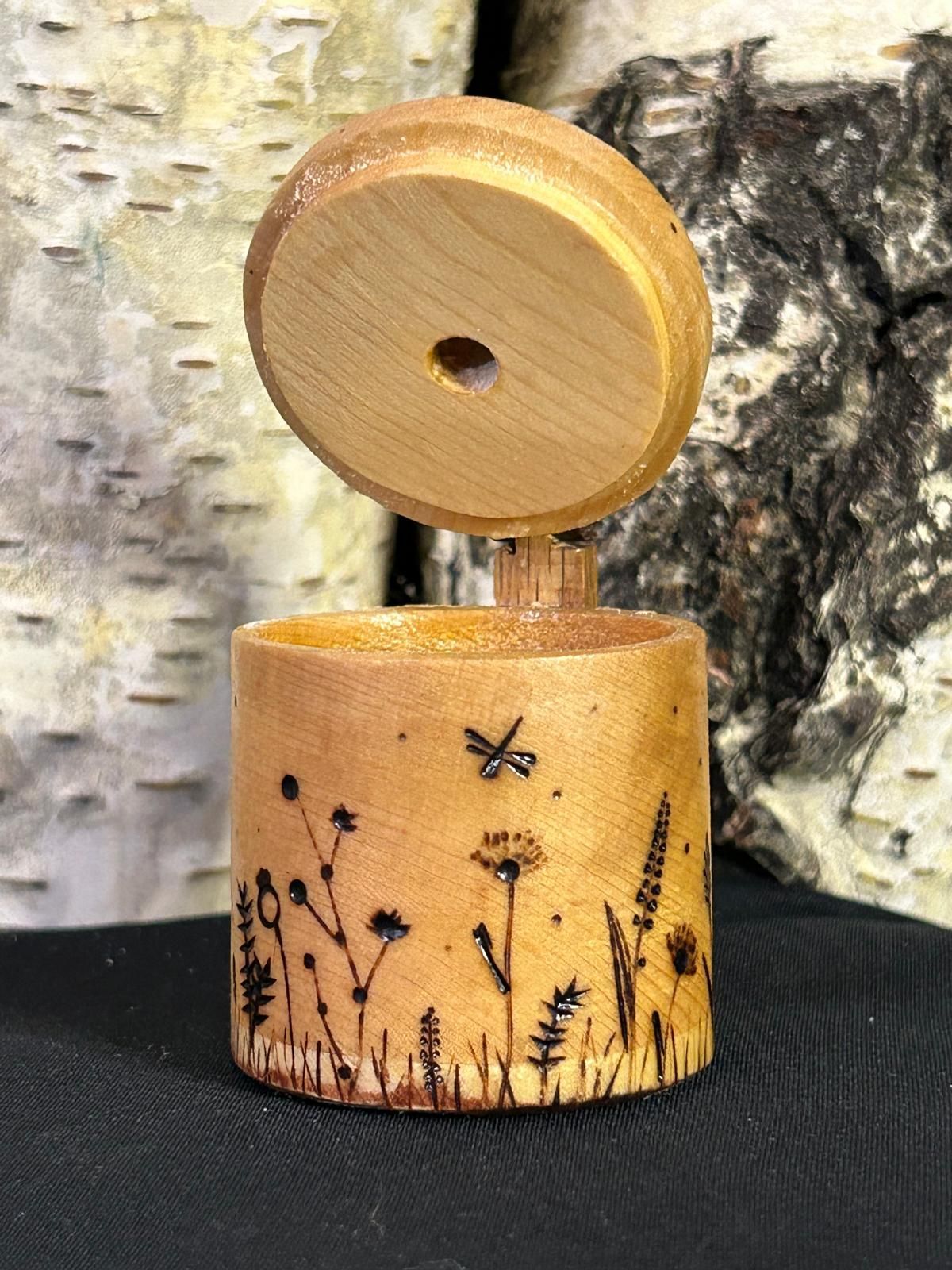 Handcrafted wooden box with a wood burnt design of Prairie flowers.