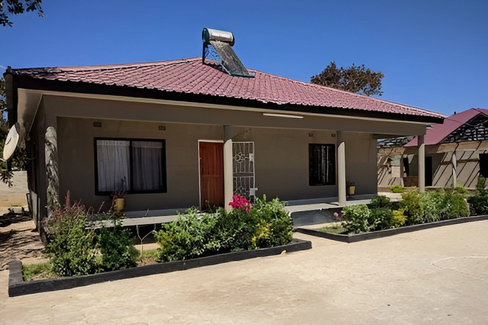 A Single-story House With a Red Tiled Roof — Daniher Building Company in Flynn, ACT
